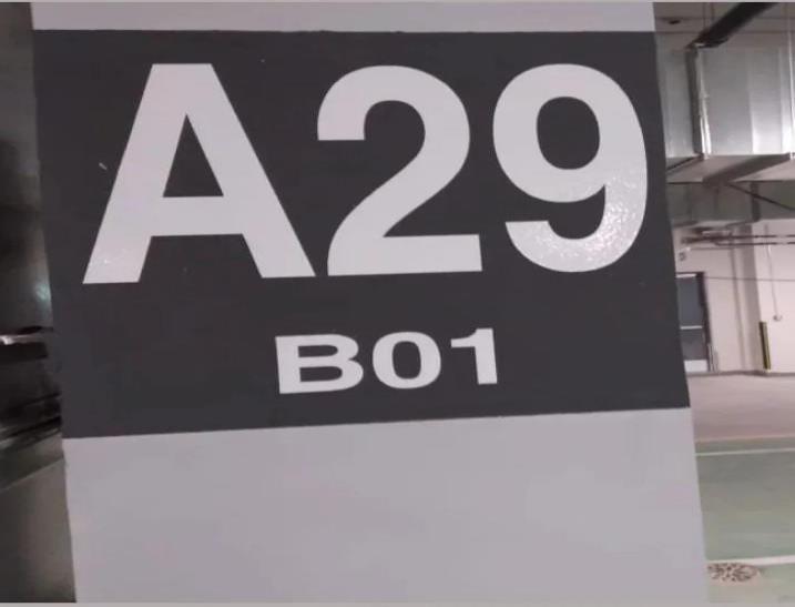 High-contrast parking level and zone identification panels A29 B01